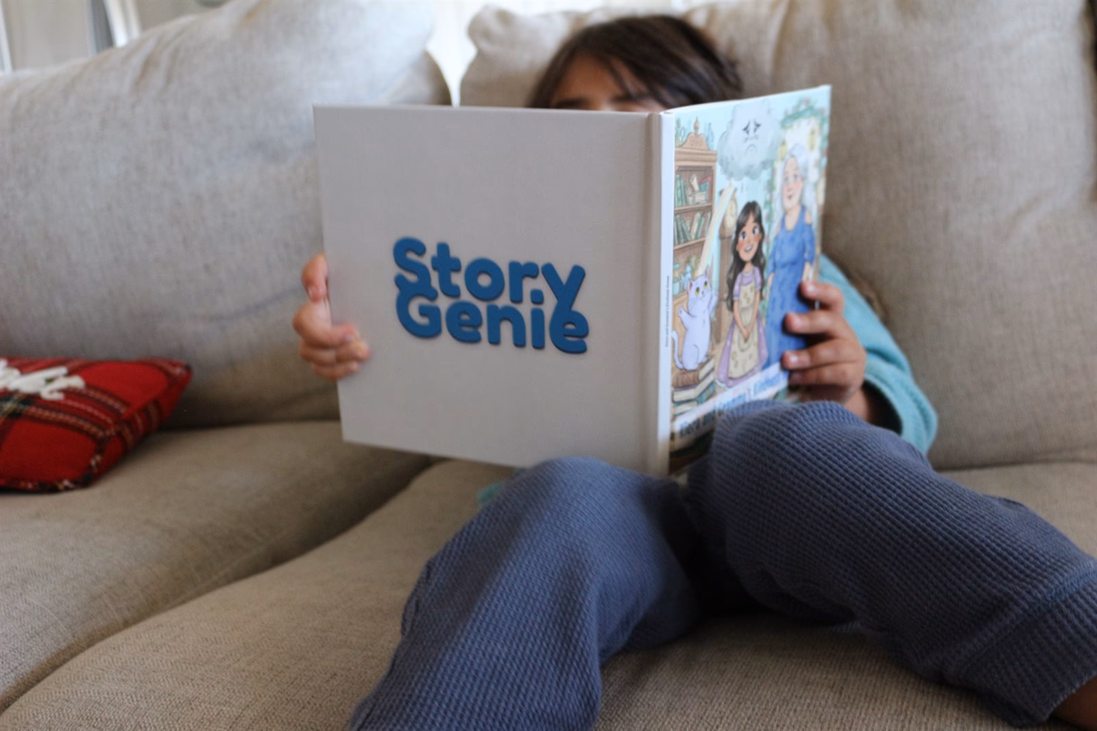 Child holding a personalized children's book