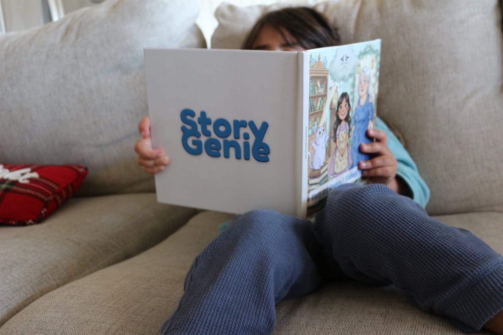 Child holding a personalized children's book